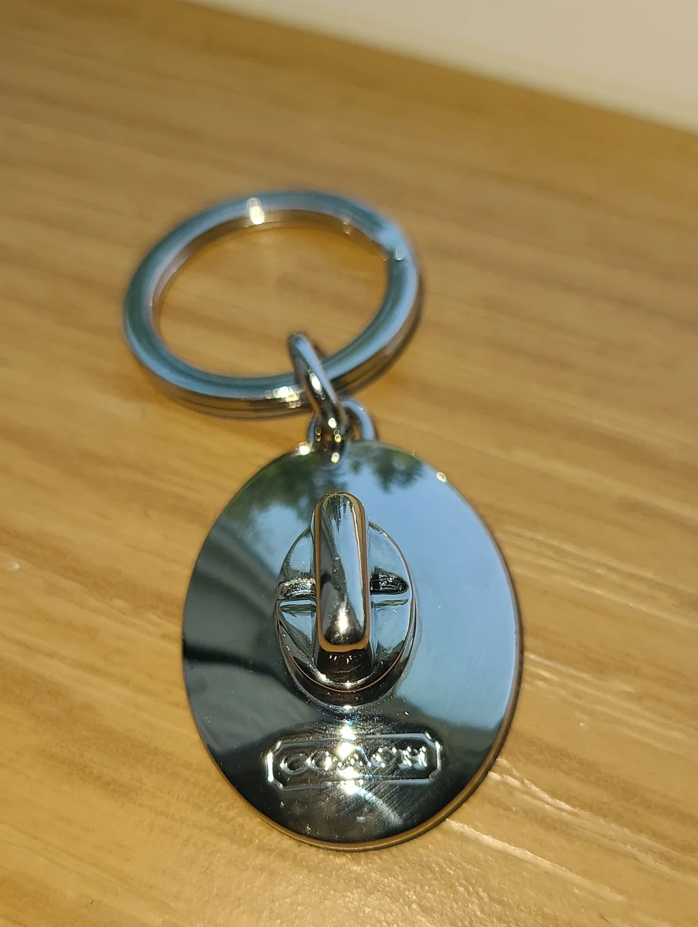 Coach Silver Oval Turnlock Keyring